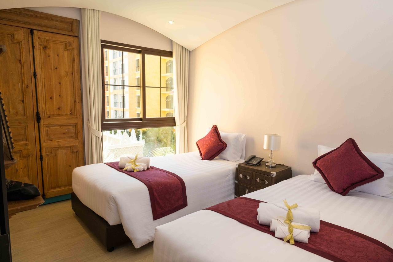 The Symphony Suites Pattaya Pantai Jomtien Bagian luar foto